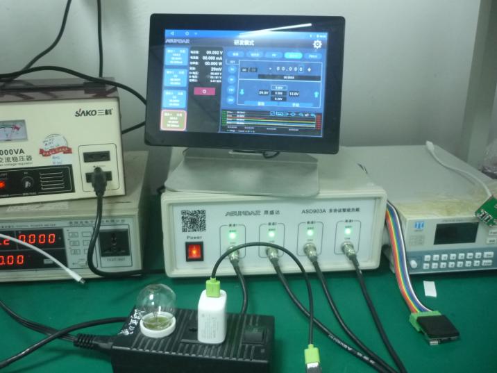 The lab in China factory is testing the output voltage of the adapter