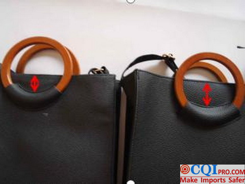 The inspector found that the position of the bag's carrying handle was not consistent with that shown in the customer's sample