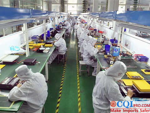 Chinese workers on the production line