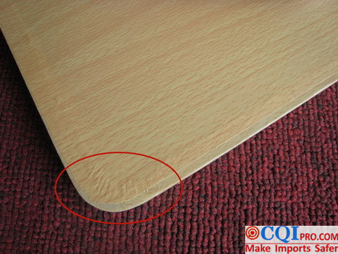 Folding table inspection in a Chinese furniture factory - 100% of the sampled products had uneven veneer edges.