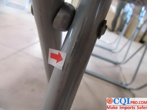 Folding table inspection in a Chinese furniture factory-Scratch mark at tube