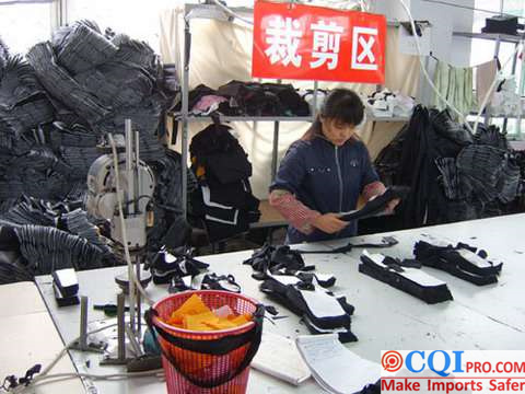 Chinese female workers in the cutting area of a garment factory