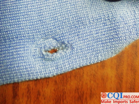 Button holes in knitwear are uneven.