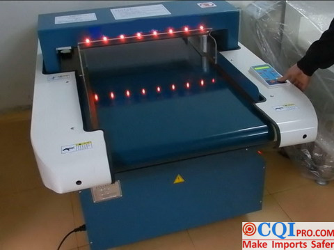 When the needle detector tests that there is a needle in the garment, the red light is on