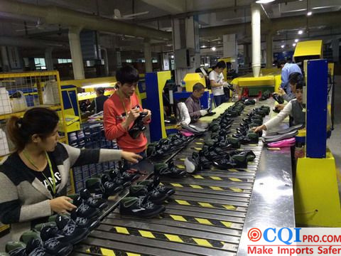 Chinese shoe factory assembly line, workers are making shoes