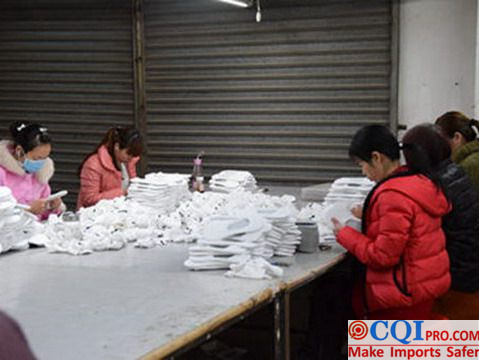 Workers in a Chinese sock factory