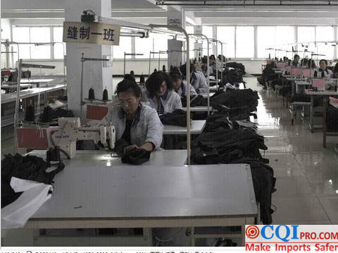 Workers in a garment factory producing sportswear